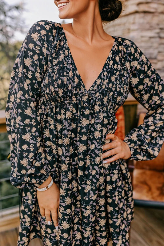 Woman wearing a floral dress with a blurred background
