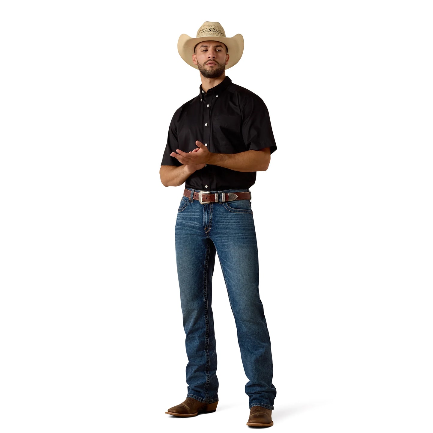 Man wearing a black shirt, blue jeans, and a straw cowboy hat on a white background