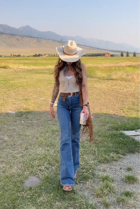 Rural America and a cowgirl in western clothing 