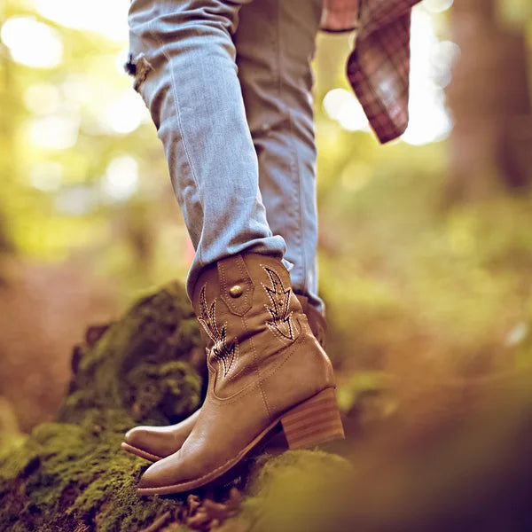 fall western boots in the fall forest