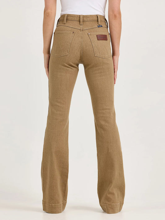 Brown flared pants worn by a person on a white background