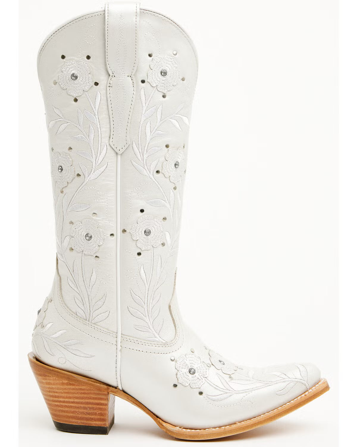 A white leather cowboy boot with floral embroidery, rhinestone embellishments, and a stacked wood-look block heel, shown against a plain white background.