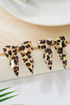 Leopard print hair bow on a white background