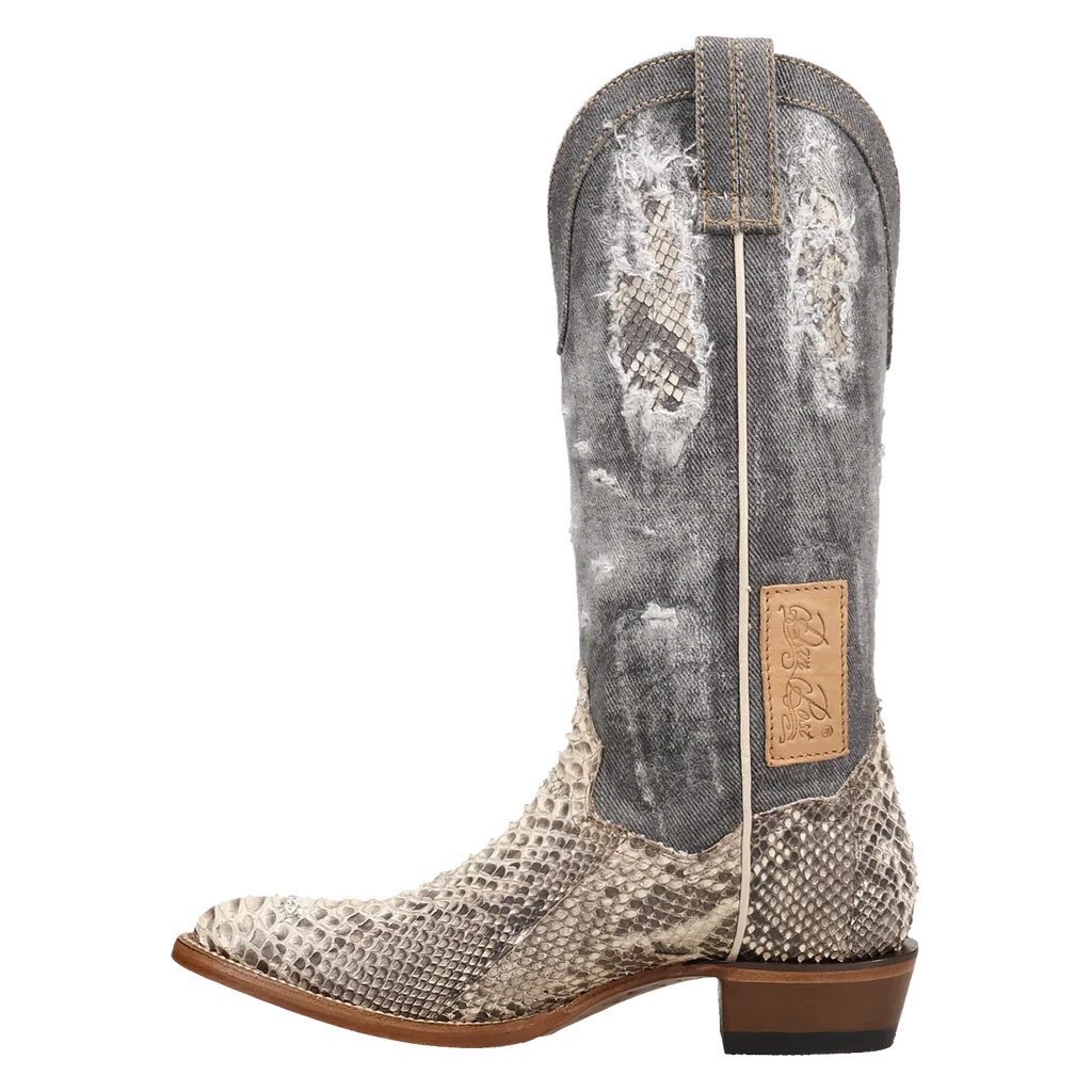 Cowboy boot with snake skin pattern on a white background