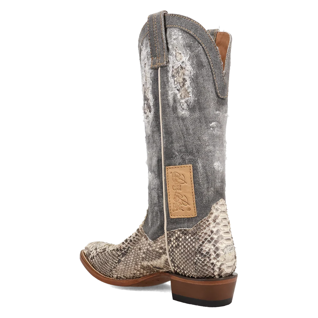 Cowboy boot with snake skin pattern on a white background