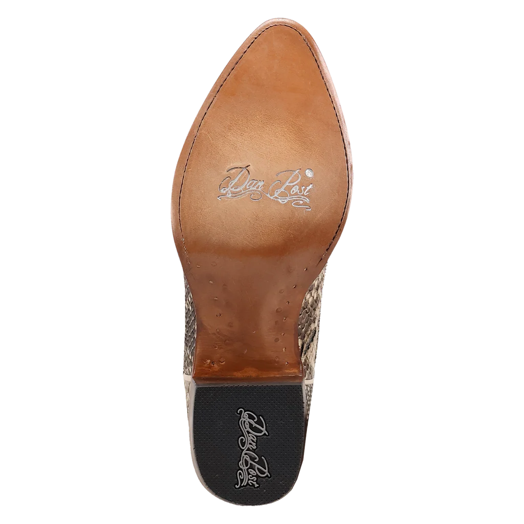 Close-up of a shoe sole with brand logo on a white background