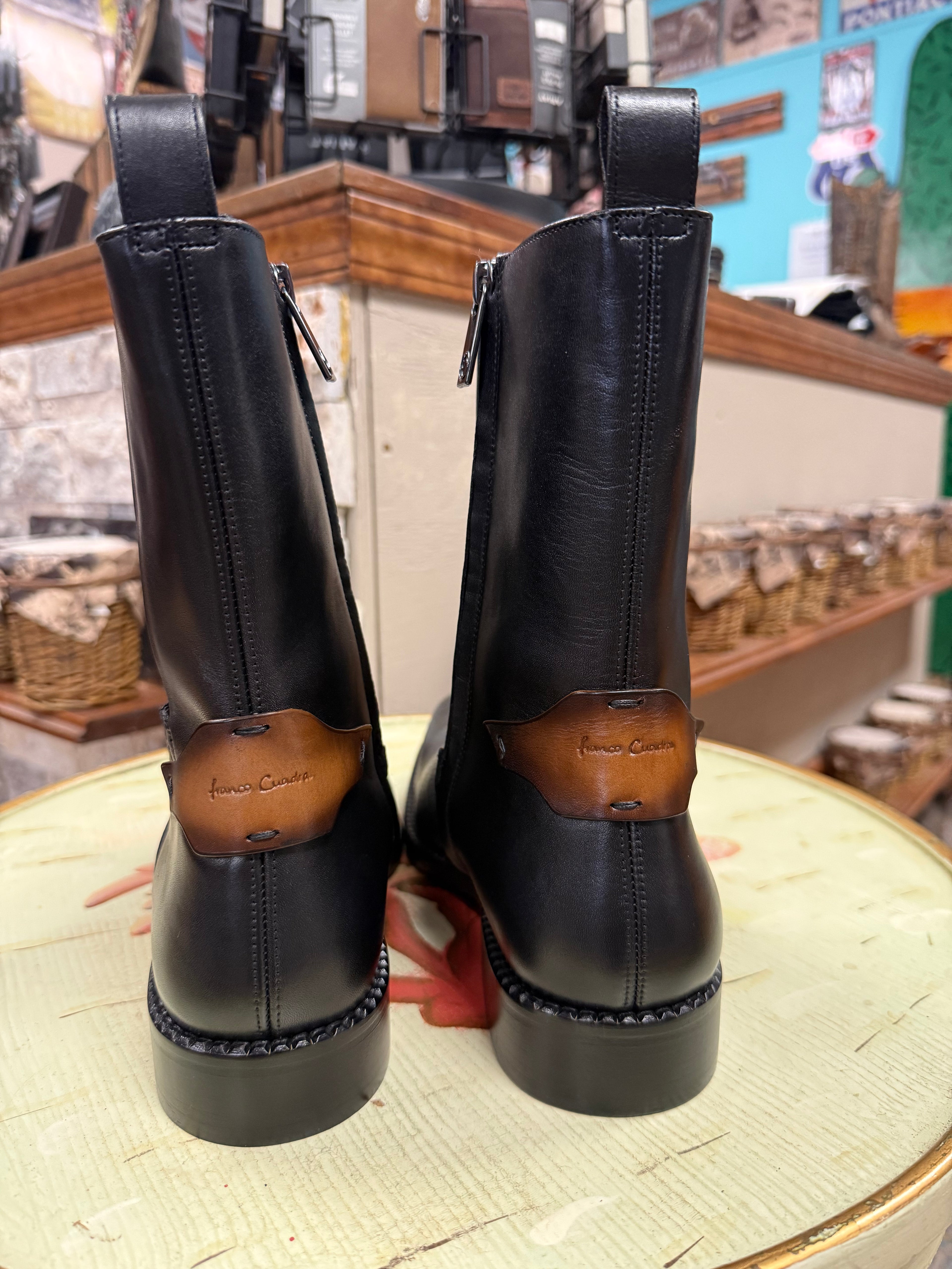 The streamlined silhouette with subtle detailing strikes the perfect balance between formal polish and everyday wearability, making them equally at home under a suit or paired with upscale casual looks. Lightweight, flexible, and refined, these boots prove that true elegance doesn't need to shout