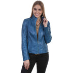 Woman wearing a blue leather jacket on a white background