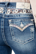 Aztec print on yoke and a faux flap pocket design.