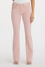 Pink jeans worn by a person on a white background