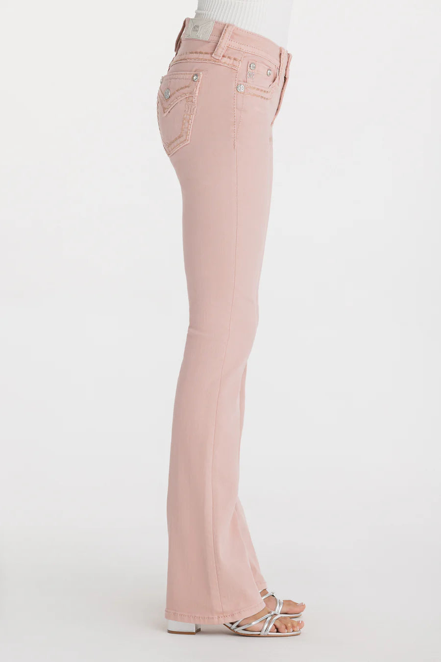Pink flared jeans on a white background