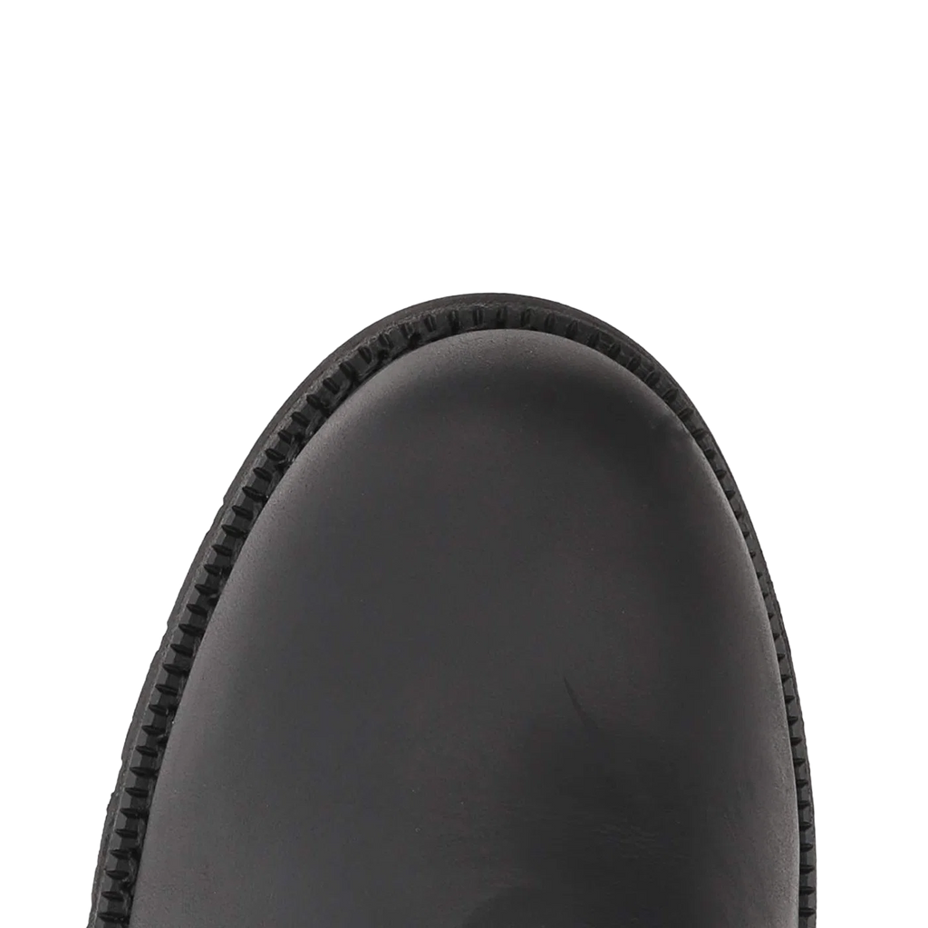 Close-up of the rounded toe of a black leather boot against a solid white background.