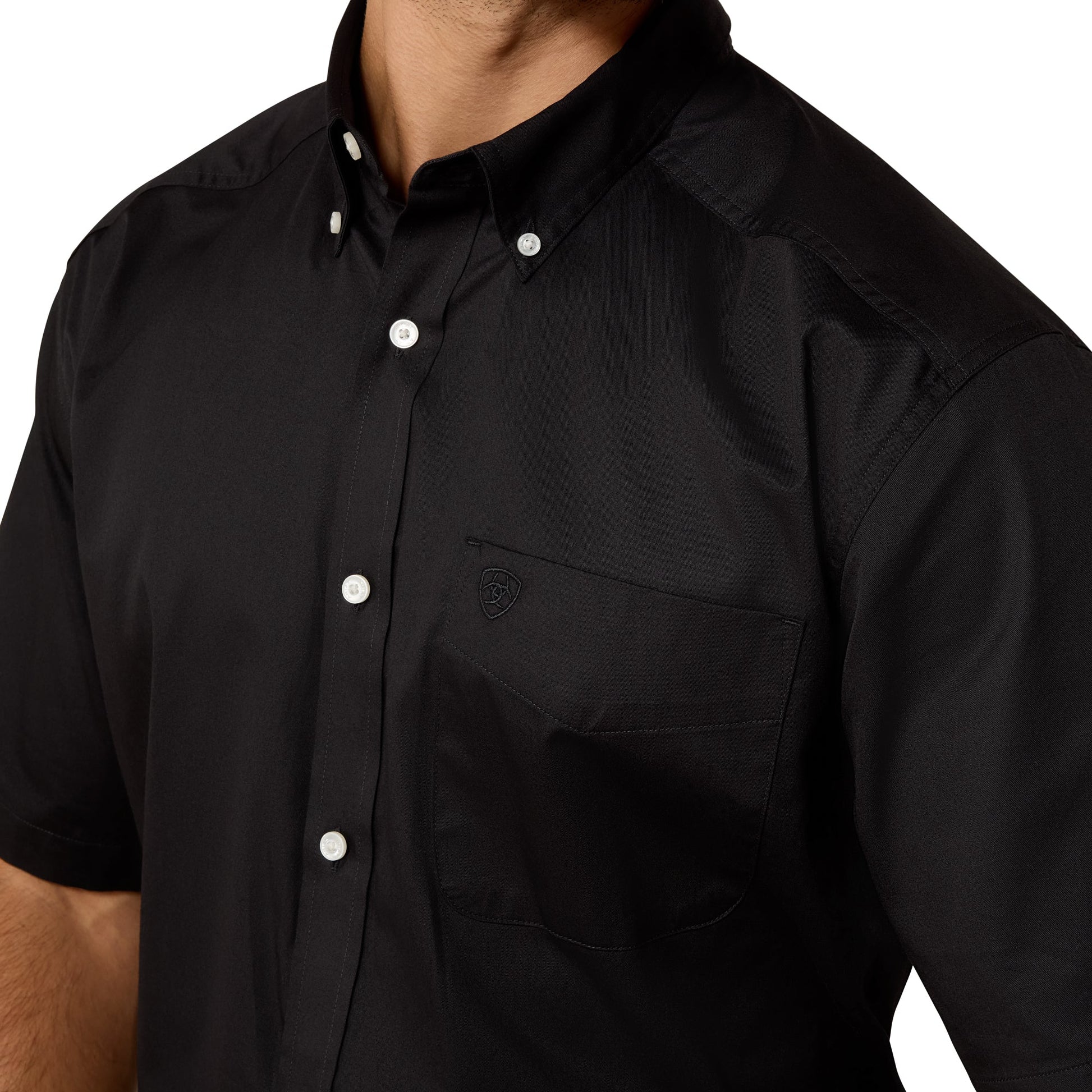 Black short-sleeve shirt with buttons on a white background