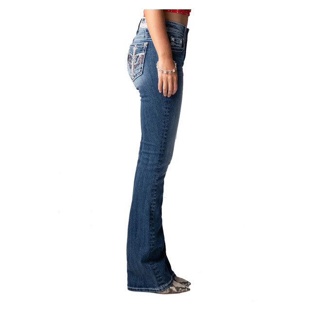 Blue jeans worn by a person on a white background